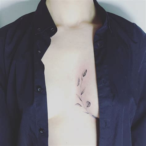 inbetween boob tattoo|Inbetween breast tattoo